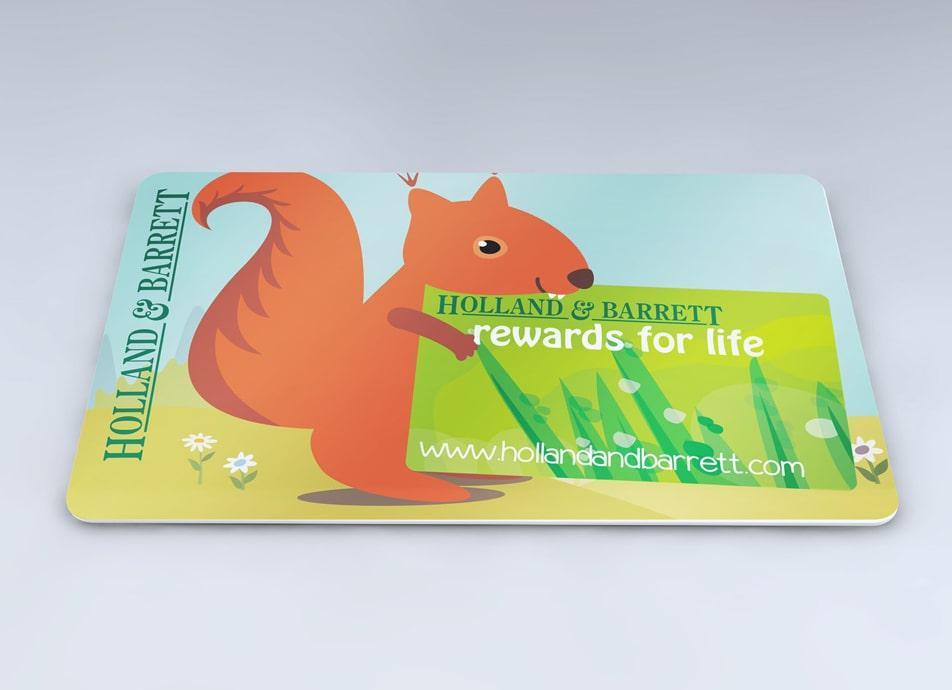 Holland and Barrett Loyalty card with cartoon illustration of Squirrel holding a card